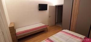 Postel nebo postele na pokoji v ubytování Casa Brugnara