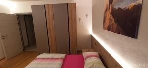Postel nebo postele na pokoji v ubytování Casa Brugnara