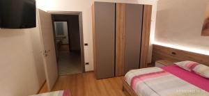 Postel nebo postele na pokoji v ubytování Casa Brugnara