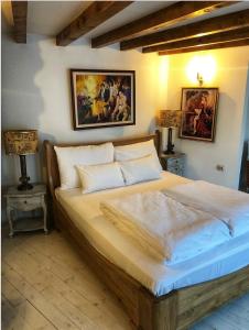 Letto o letti in una camera di Garni hotel Oblačinsko jezero