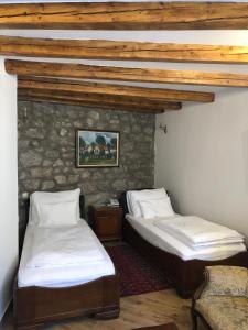 Letto o letti in una camera di Garni hotel Oblačinsko jezero