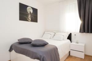 Apartment Ruby客房内的一张或多张床位
