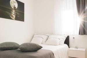 Apartment Ruby客房内的一张或多张床位