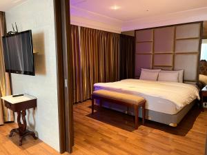 TV a/nebo společenská místnost v ubytování Hotel International Changwon