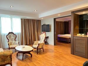 TV a/nebo společenská místnost v ubytování Hotel International Changwon