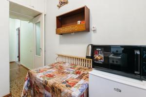 Cuina o zona de cuina de Welcome Apartment, Уютная Квартира у клиники Мешалкина