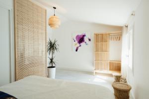 Postel nebo postele na pokoji v ubytování Les Lodges de Saint Cassien 2