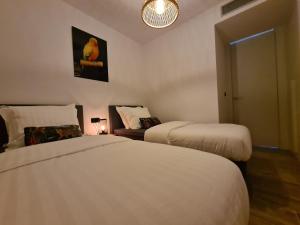 A bed or beds in a room at Residence Bali