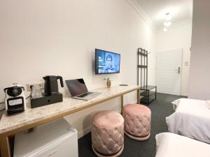 Telewizja i/lub zestaw kina domowego w obiekcie Apartamenty Stary Browar Oleśnica