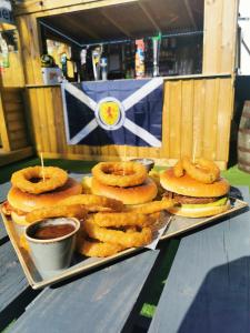a tray of onion rings sitting on top of a table at The Swan Inn in Stranraer