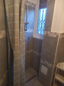 A bathroom at Bilocale 7 piano balcone vista skyline