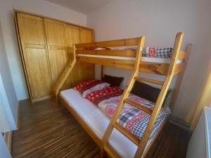 Posteľ alebo postele v izbe v ubytovaní Bella apartman
