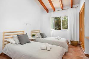 Postel nebo postele na pokoji v ubytování Villa Menorca Sirio by Mauter Villas