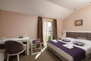 Krevet ili kreveti u jedinici u objektu Family Hotel Zanè