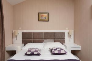 Family Hotel Zanè客房内的一张或多张床位
