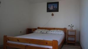Posteľ alebo postele v izbe v ubytovaní Apartments Krizmanić