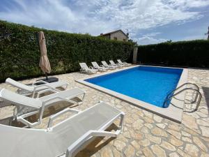 Bazén v ubytování Paradise Villa Cassonni Istria 4 Stars nebo v jeho okolí