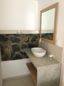 Ванная комната в Suites Amma Noronha