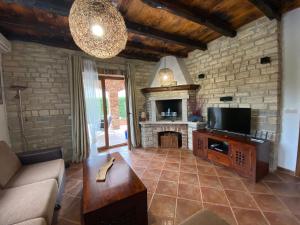 TV a/nebo společenská místnost v ubytování Paradise Villa Cassonni Istria 4 Stars