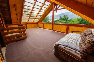 Fotografie z fotogalerie ubytování Хата Різьбяра v destinaci Beloberëzka + 37 fotografií