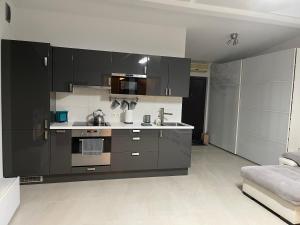 Nhà bếp/bếp nhỏ tại Apartament Rodzinny Ostrowiec Św +25 ảnh