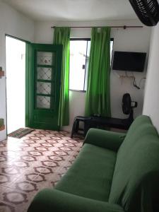 Lova arba lovos apgyvendinimo įstaigoje Nilda Casas e Quartos para Aluguel