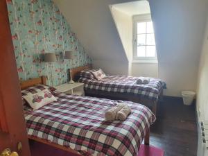 Posteľ alebo postele v izbe v ubytovaní Argyll Mansions Penthouse