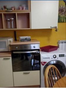 Kuchyňa alebo kuchynka v ubytovaní Iris Casa Vacanze