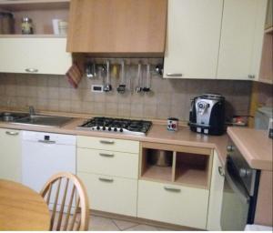 Kuchyňa alebo kuchynka v ubytovaní Iris Casa Vacanze
