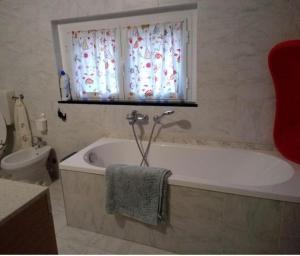 Kúpeľňa v ubytovaní Iris Casa Vacanze