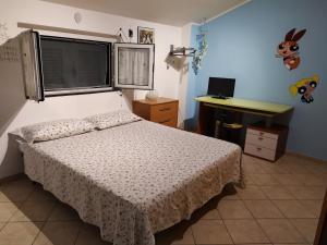 Posteľ alebo postele v izbe v ubytovaní Iris Casa Vacanze