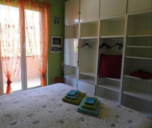 Posteľ alebo postele v izbe v ubytovaní Iris Casa Vacanze + 37 fotografií