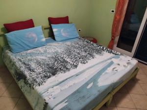 Posteľ alebo postele v izbe v ubytovaní Iris Casa Vacanze