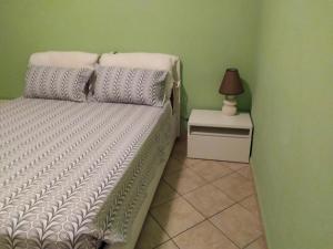 Posteľ alebo postele v izbe v ubytovaní Iris Casa Vacanze