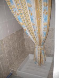 Koupelna v ubytování Hôtel L'Acropole