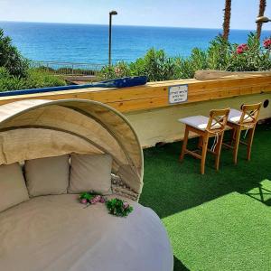 Fotografie z fotogalerie ubytování כוכב הים וילה מול הגלים וברכה פרטית סגורה v destinaci Netanja