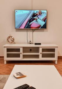 A television and/or entertainment centre at Village experience - Skadar lake