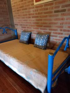 Ένα ή περισσότερα κρεβάτια σε δωμάτιο στο Departamento Estela Marys