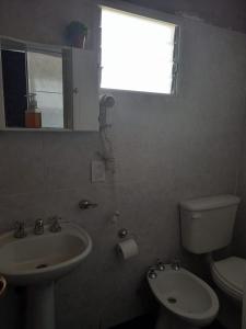 Ένα μπάνιο στο Departamento Estela Marys