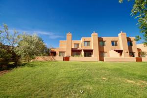 a large house with a yard in front of it at Castle View #3368 in Moab