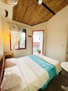 Un pat sau paturi într-o cameră la Salento_littlehouse