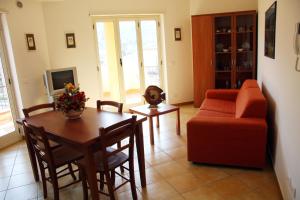 Posezení v ubytování Residence Gioiosa Marea