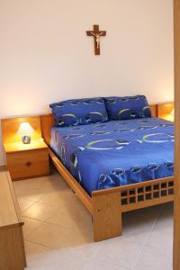 Postel nebo postele na pokoji v ubytování Residence Gioiosa Marea
