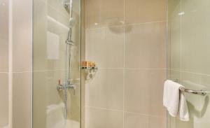 Koupelna v ubytování Le'venue Hotel