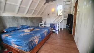 Voodi või voodid majutusasutuse Saho Coffee & Rooms toas