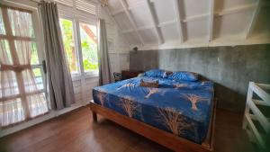 Voodi või voodid majutusasutuse Saho Coffee & Rooms toas