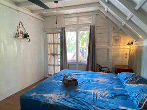 Voodi või voodid majutusasutuse Saho Coffee & Rooms toas