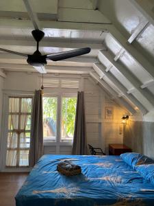 Katil atau katil-katil dalam bilik di Saho Coffee & Rooms