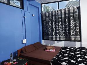 Red Rock Arambol Beach tesisinde bir odada yatak veya yataklar