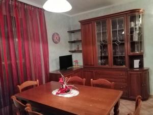 Televízia a/alebo spoločenská miestnosť v ubytovaní Apartment "Casa Maya"